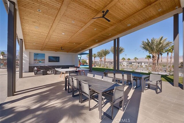 35719 Mccarthy St, Palm Desert, CA 92211 - view of patio / terrace with a ceiling fan, fence, and outdoor dining space