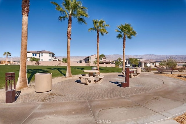 35719 Mccarthy St, Palm Desert, CA 92211 - view of property's community with a lawn, a residential view, and a mountain view