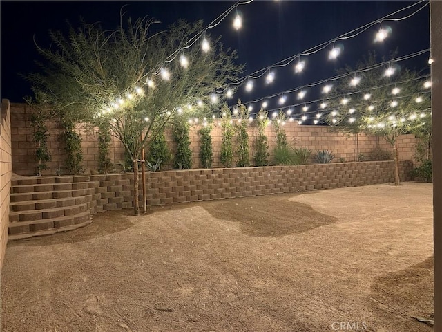35719 Mccarthy St, Palm Desert, CA 92211 - yard at twilight with a fenced backyard