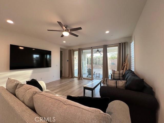 35719 Mccarthy St, Palm Desert, CA 92211 - living area with recessed lighting, a ceiling fan, light wood-style flooring, and baseboards