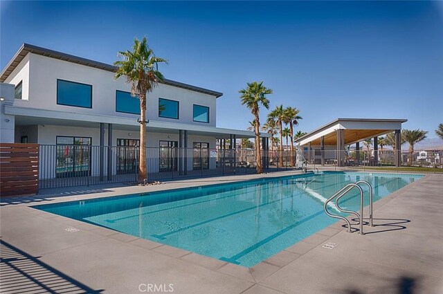 35719 Mccarthy St, Palm Desert, CA 92211 - pool featuring fence and a patio