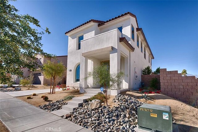 35719 Mccarthy St, Palm Desert, CA 92211 - mediterranean / spanish-style home featuring a tiled roof and stucco siding