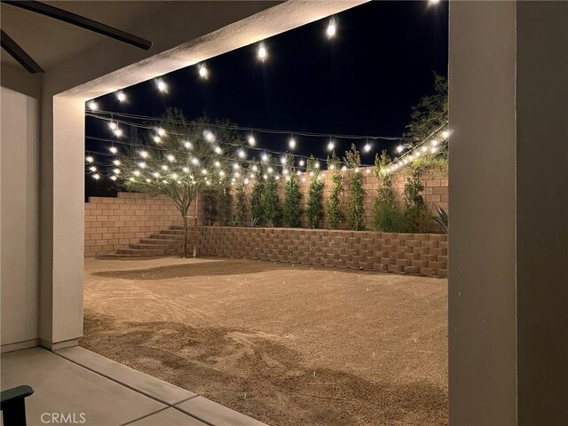 35719 Mccarthy St, Palm Desert, CA 92211 - yard at night featuring fence