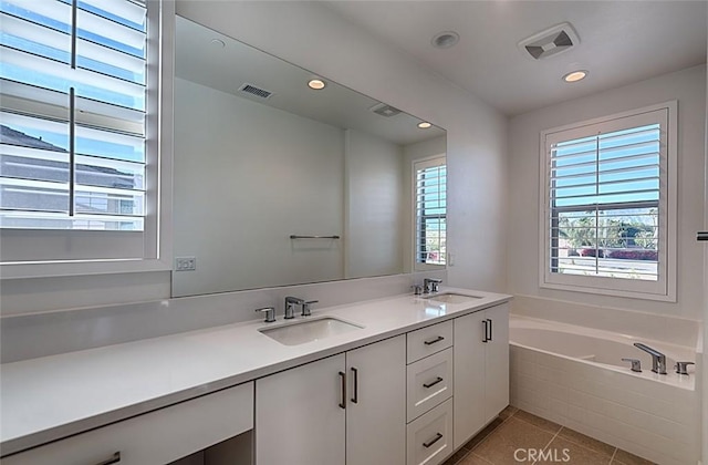 35719 Mccarthy St, Palm Desert, CA 92211 - full bath featuring a sink, tile patterned floors, a garden tub, and visible vents