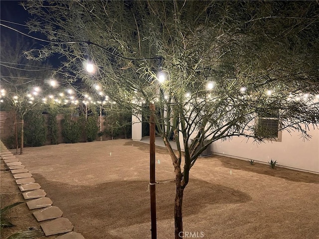 35719 Mccarthy St, Palm Desert, CA 92211 - yard at night featuring fence