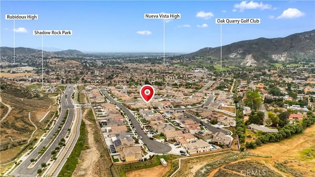 6506 Zion Way, Jurupa Valley, CA 92509 - aerial view of property and surrounding area featuring a mountain backdrop and nearby suburban area