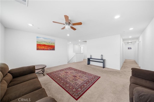 6506 Zion Way, Jurupa Valley, CA 92509 - living area featuring light carpet, ceiling fan, and recessed lighting