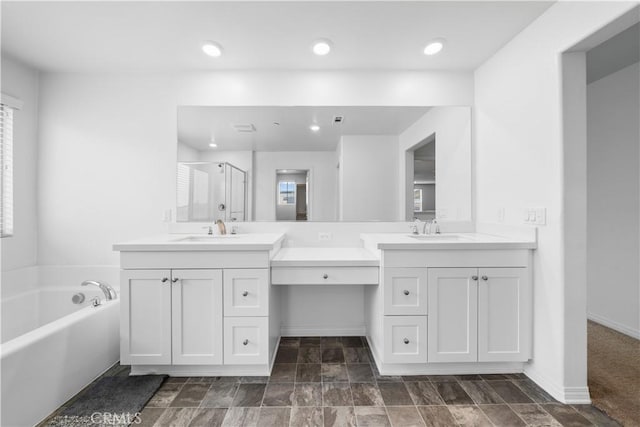 6506 Zion Way, Jurupa Valley, CA 92509 - bathroom with a stall shower, vanity, a bath, and baseboards