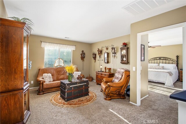 6347 Lyndsey St, Eastvale, CA 92880 - carpeted living area with ceiling fan and visible vents