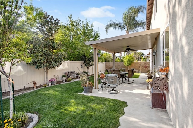 6347 Lyndsey St, Eastvale, CA 92880 - view of yard featuring a fenced backyard, ceiling fan, and a patio area