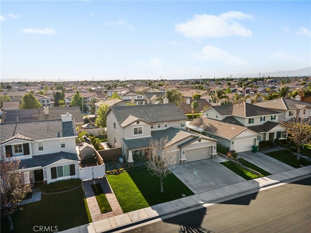 6347 Lyndsey St, Eastvale, CA 92880 - drone / aerial view with a residential view