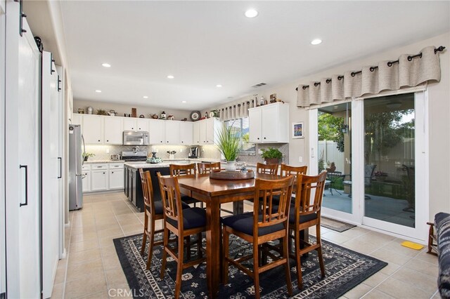 6347 Lyndsey St, Eastvale, CA 92880 - dining space with recessed lighting, light tile patterned floors, and visible vents