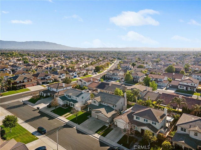 6347 Lyndsey St, Eastvale, CA 92880 - drone / aerial view with a residential view and a mountain view