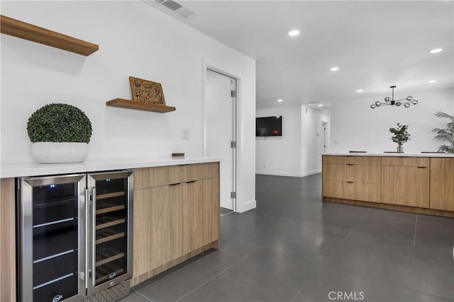 2480 N Aurora Dr, Palm Springs, CA 92262 - bar area featuring wine cooler, recessed lighting, and a chandelier