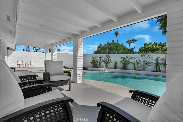 2480 N Aurora Dr, Palm Springs, CA 92262 - view of swimming pool featuring a fenced backyard, a patio, and an outdoor fire pit