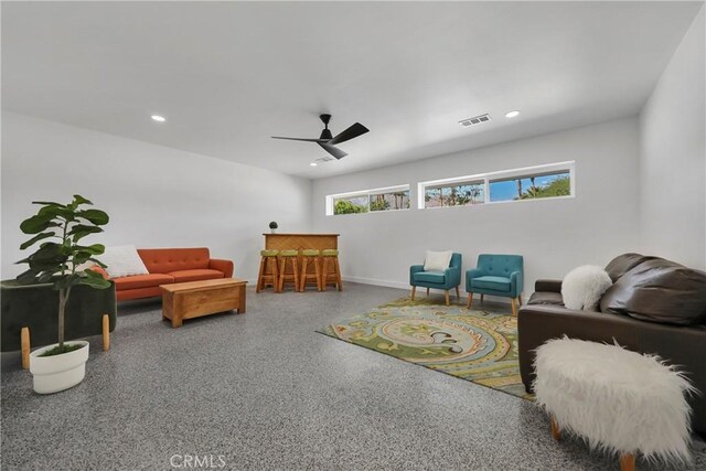 2480 N Aurora Dr, Palm Springs, CA 92262 - living room featuring speckle patterned floor, a ceiling fan, and recessed lighting