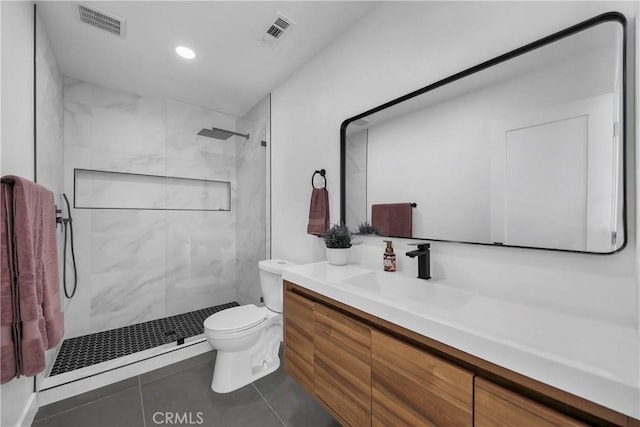 2480 N Aurora Dr, Palm Springs, CA 92262 - full bathroom with vanity, a marble finish shower, tile patterned floors, and recessed lighting