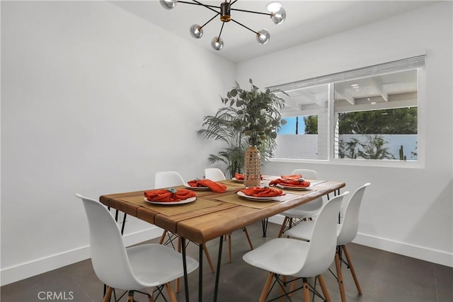 2480 N Aurora Dr, Palm Springs, CA 92262 - dining room featuring a chandelier and baseboards