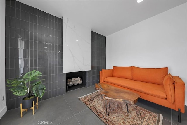tiled living area featuring recessed lighting and tile walls