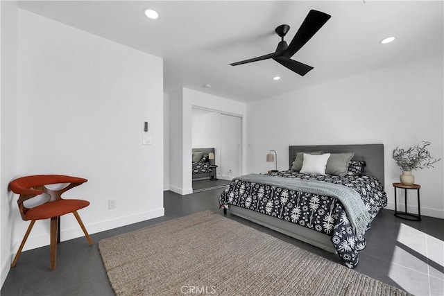 bedroom with baseboards, ceiling fan, a closet, and recessed lighting