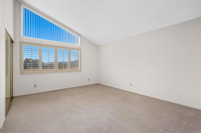 1109 Calle Del Baston, San Marcos, CA 92078 - empty room with lofted ceiling and carpet