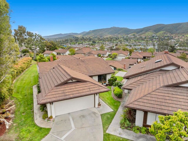 1109 Calle Del Baston, San Marcos, CA 92078 - aerial perspective of suburban area featuring a mountainous background