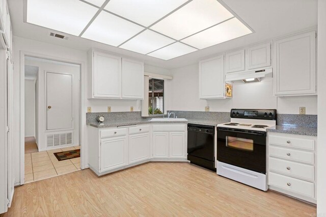 1109 Calle Del Baston, San Marcos, CA 92078 - kitchen featuring black dishwasher, electric range, under cabinet range hood, white cabinets, and light wood finished floors