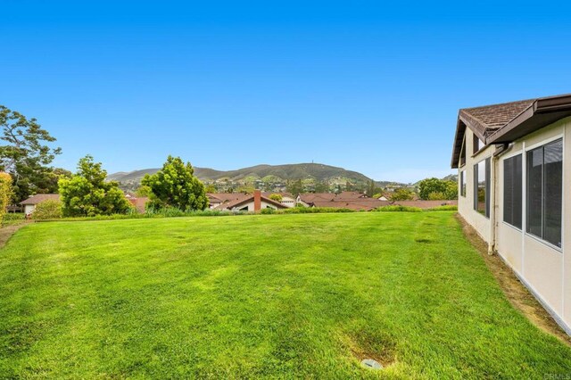 1109 Calle Del Baston, San Marcos, CA 92078 - view of grassy yard with a mountain view
