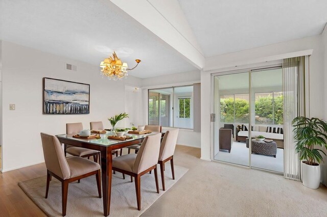 1109 Calle Del Baston, San Marcos, CA 92078 - dining space with a chandelier, plenty of natural light, and lofted ceiling