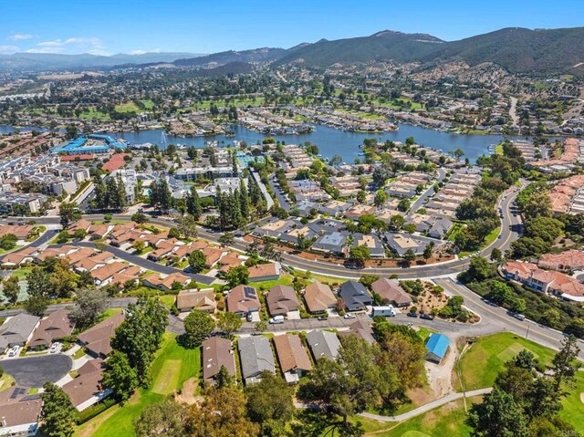 1109 Calle Del Baston, San Marcos, CA 92078 - aerial overview of property's location with a water and mountain view and nearby suburban area