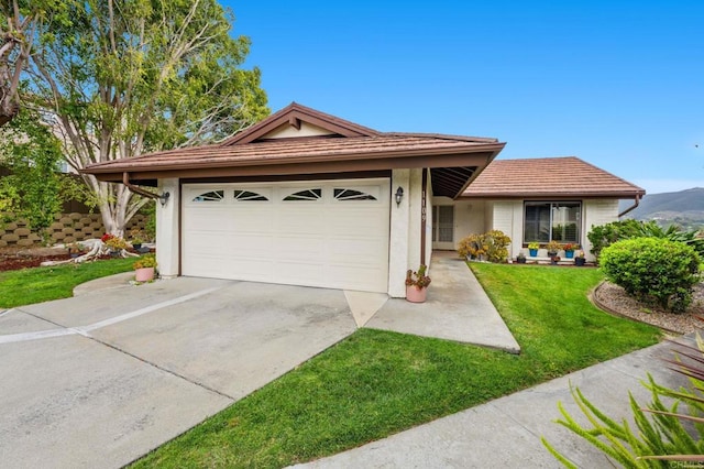 1109 Calle Del Baston, San Marcos, CA 92078 - ranch-style house with an attached garage, stucco siding, concrete driveway, and a front lawn