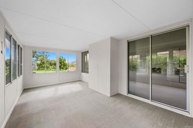 1109 Calle Del Baston, San Marcos, CA 92078 - unfurnished sunroom featuring carpet floors