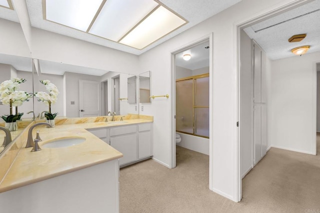 1109 Calle Del Baston, San Marcos, CA 92078 - full bathroom with vanity, combined bath / shower with glass door, and carpet flooring