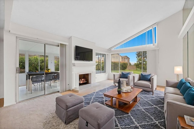 1109 Calle Del Baston, San Marcos, CA 92078 - living area with healthy amount of natural light, high vaulted ceiling, and a lit fireplace