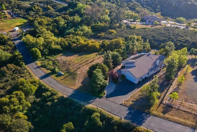 bird's eye view with a forest view