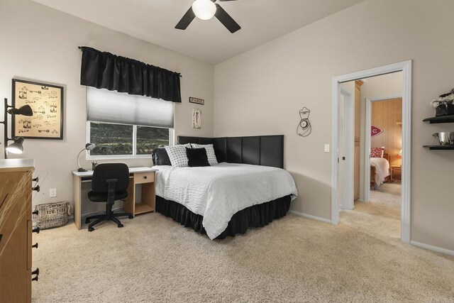 bedroom with carpet floors, a ceiling fan, and baseboards