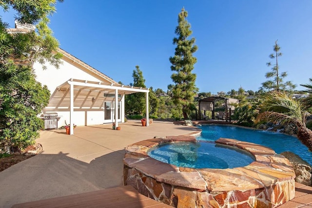 view of pool with a pergola, an in ground hot tub, and a patio