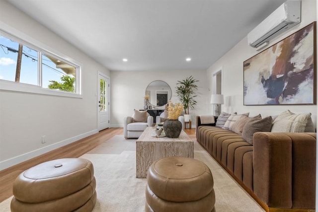 5061 Canosa Ave, San Diego, CA 92117 - living room featuring light wood-style floors, baseboards, a wall unit AC, and recessed lighting
