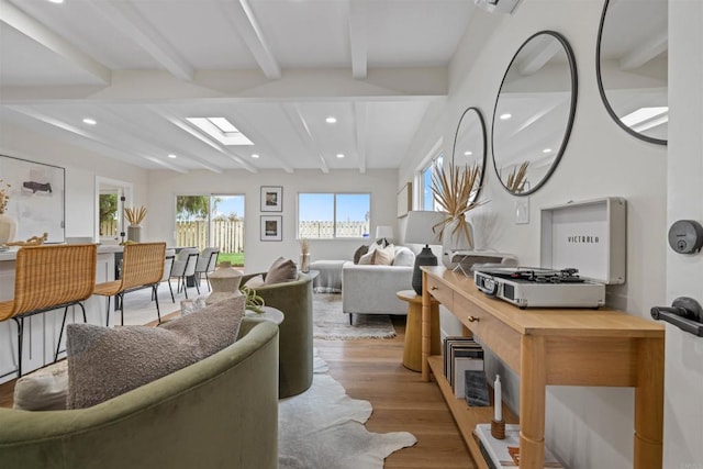 5061 Canosa Ave, San Diego, CA 92117 - living room featuring recessed lighting, wood finished floors, and beam ceiling