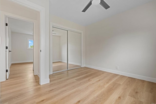 5061 Canosa Ave, San Diego, CA 92117 - unfurnished bedroom featuring baseboards, a ceiling fan, light wood-style flooring, and a closet