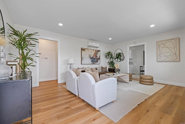 5061 Canosa Ave, San Diego, CA 92117 - living room with recessed lighting, baseboards, light wood-style flooring, and a wall mounted air conditioner