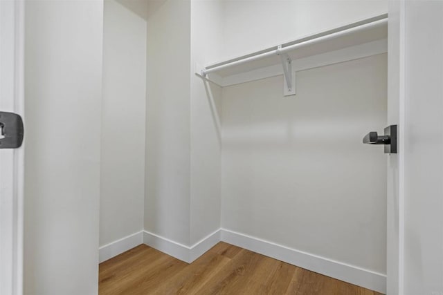 5061 Canosa Ave, San Diego, CA 92117 - walk in closet with wood finished floors