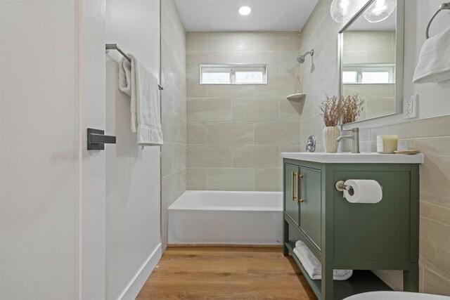 5061 Canosa Ave, San Diego, CA 92117 - bathroom featuring shower / bath combination, wood finished floors, and vanity