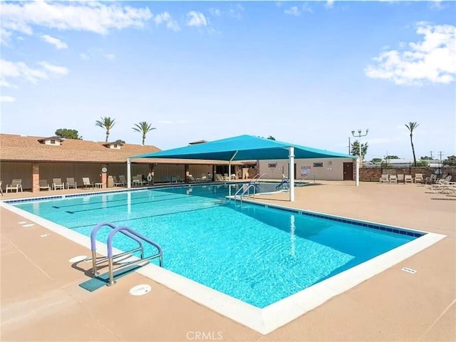 community pool featuring a patio