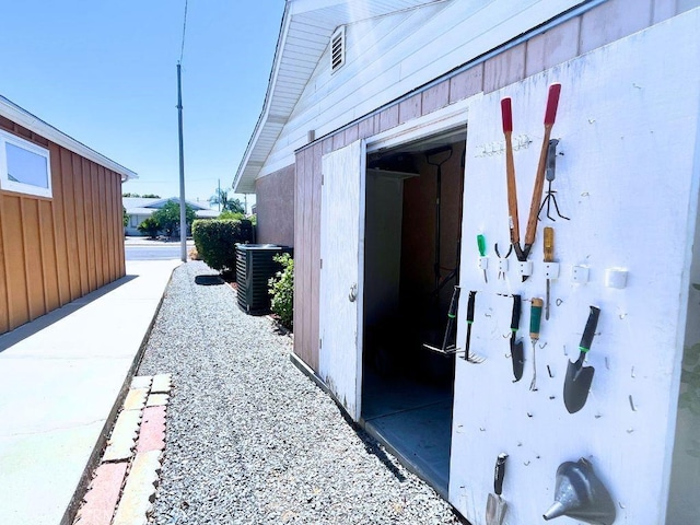 exterior space with central air condition unit