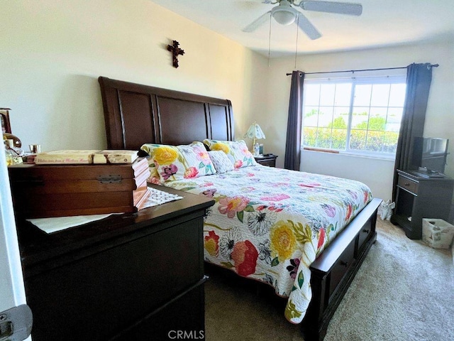 carpeted bedroom with a ceiling fan