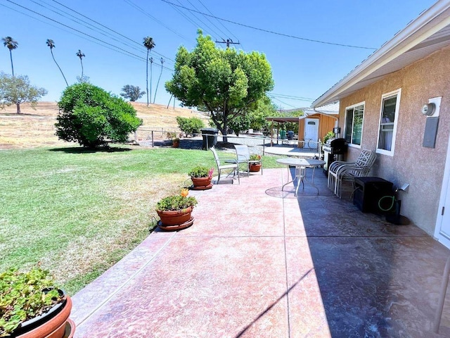 view of patio / terrace with a fenced backyard and grilling area