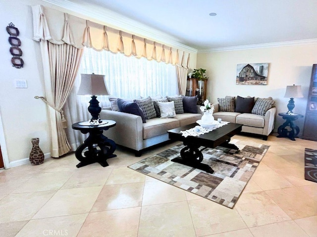 living room with crown molding, baseboards, and tile patterned flooring