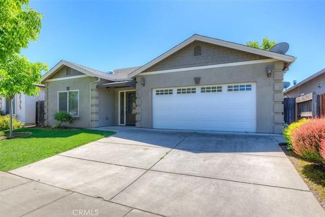 single story home featuring fence, a front lawn, a garage, stucco siding, and concrete driveway