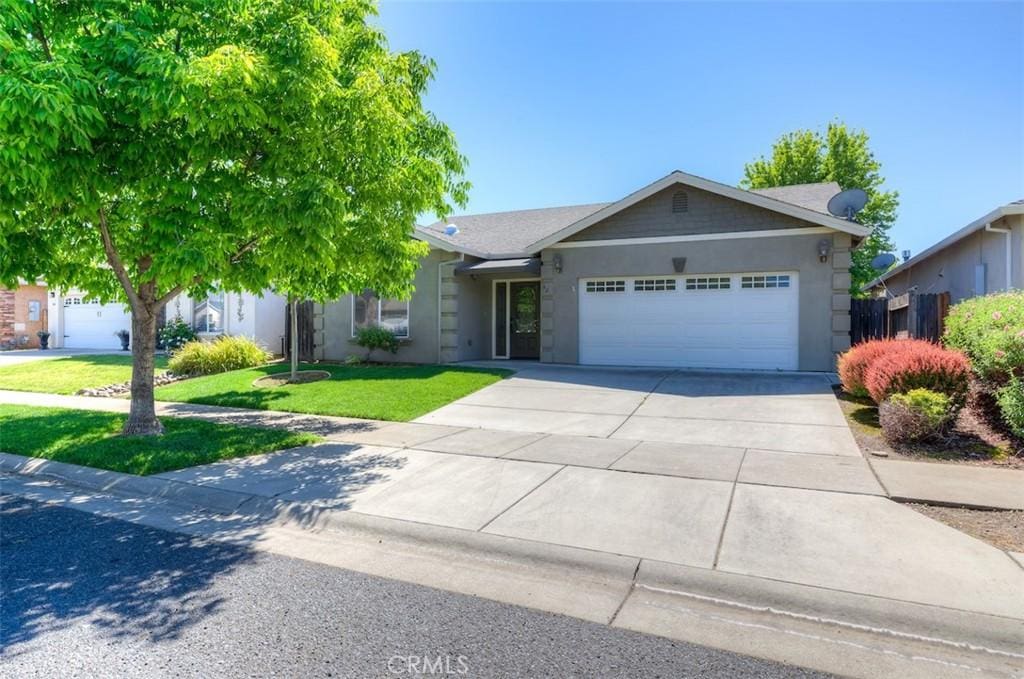 48 Redeemers, Chico, CA 95973 - single story home with a garage, concrete driveway, and a front yard